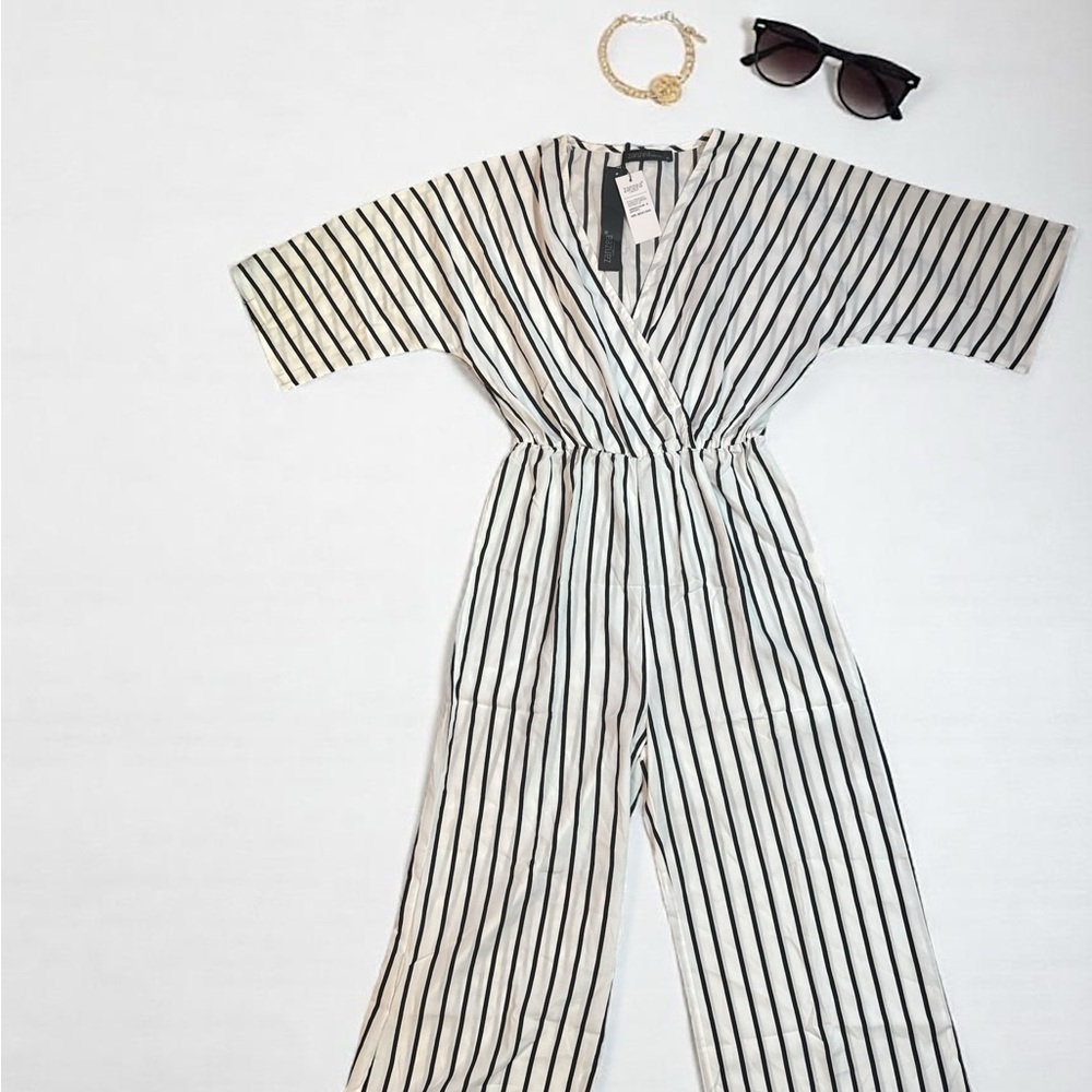 Striped Black and White Jumpsuit only! (No accessories included)